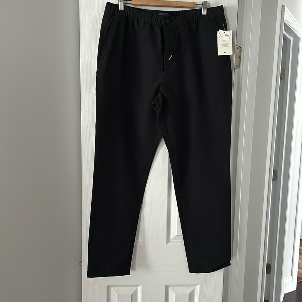 H & M.  Men’s pants 38R  Black Brand NWT